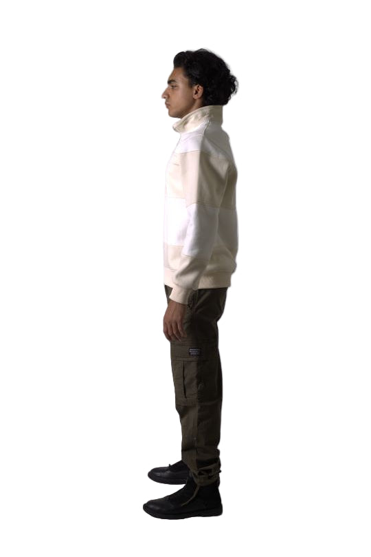 Person standing with feet together on a plain background