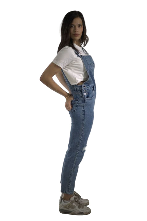 Person wearing a white shirt and blue jeans on a plain background