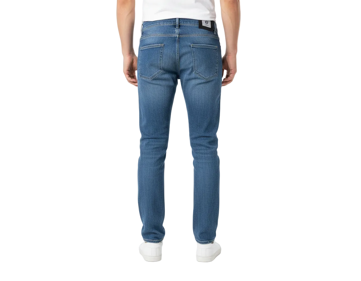 Person wearing blue jeans on a white background